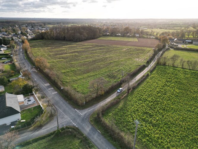 Photo aérienne du terrain pour le lotissement Embocage à FENEU